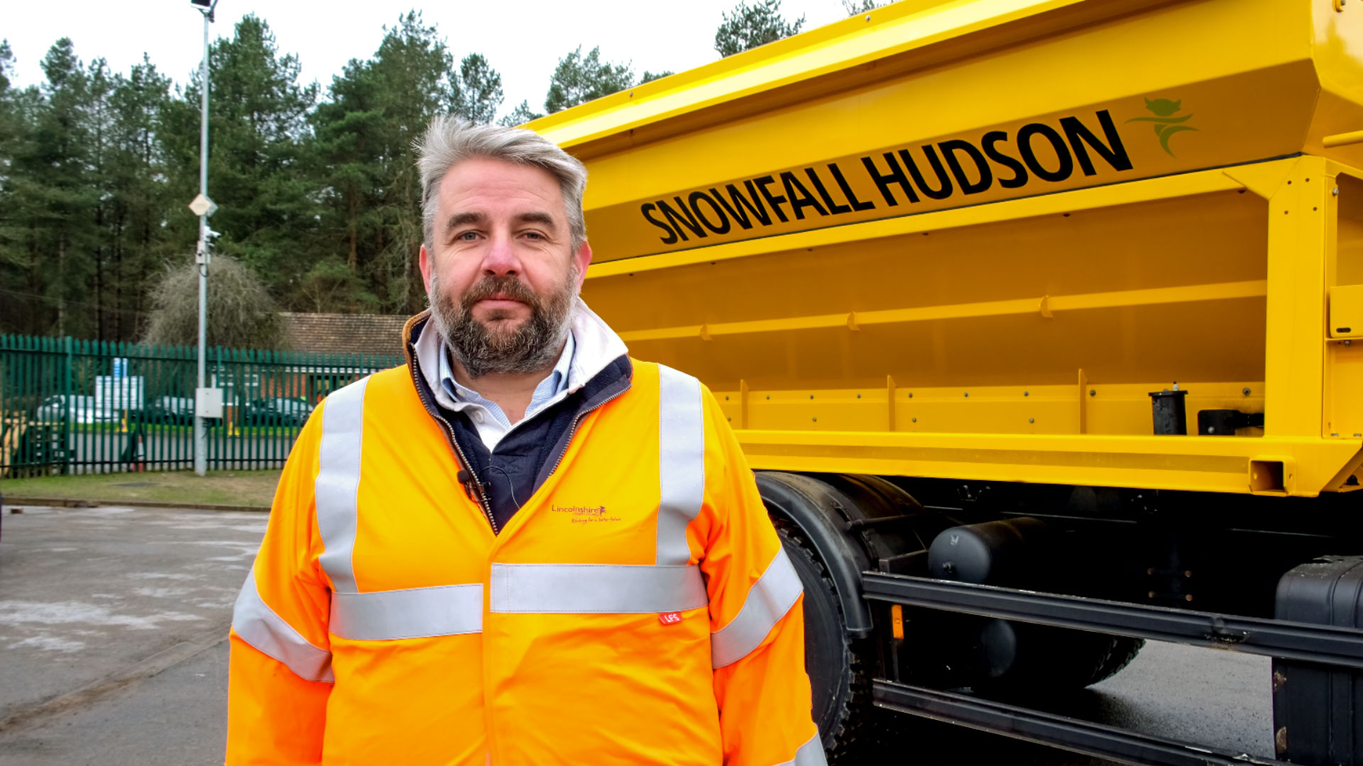 Cllr Richard Davies in front of gritter