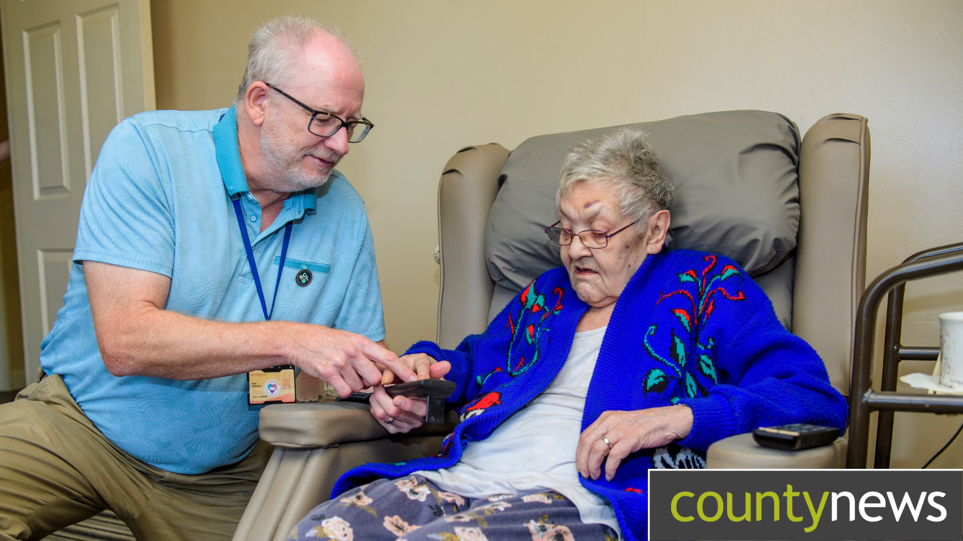 A service user receiving help from an occupational therapist