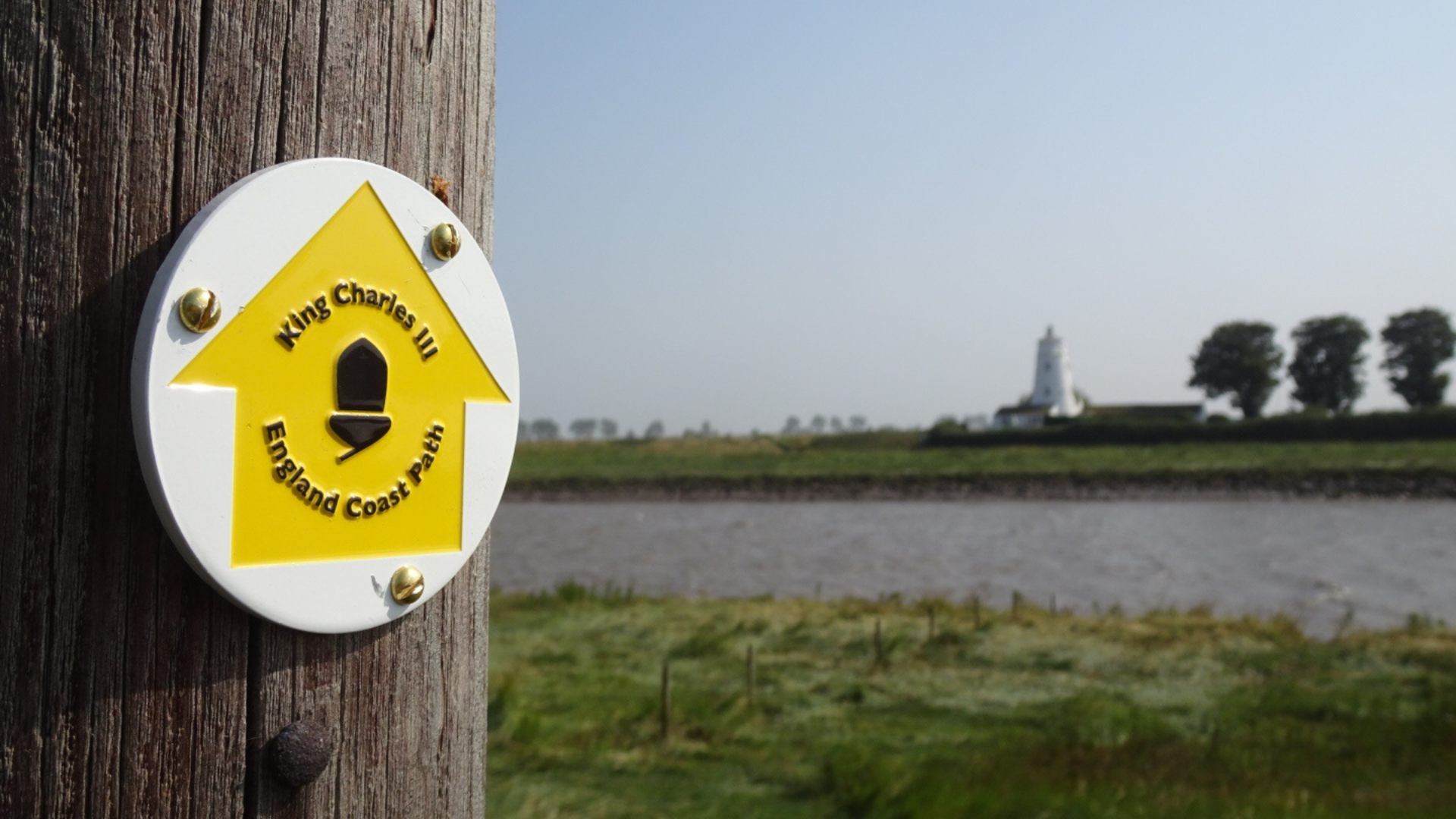 A route marker which says King Charles Coast Path