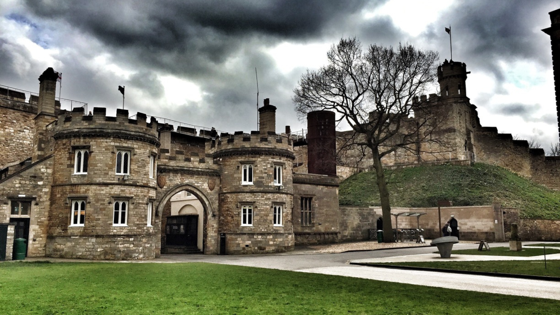 Dark grey skies above a castle