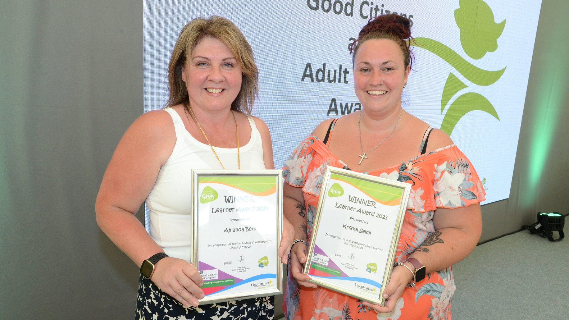 Amanda Bere (left) and Krystal Selmi (right) with their awards