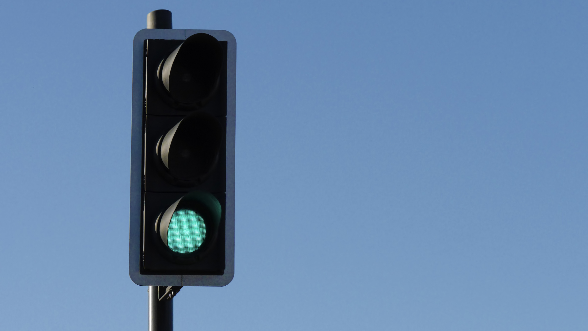 A traffic light currently on green